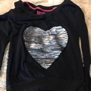 Black long sleeve shirt with a heart